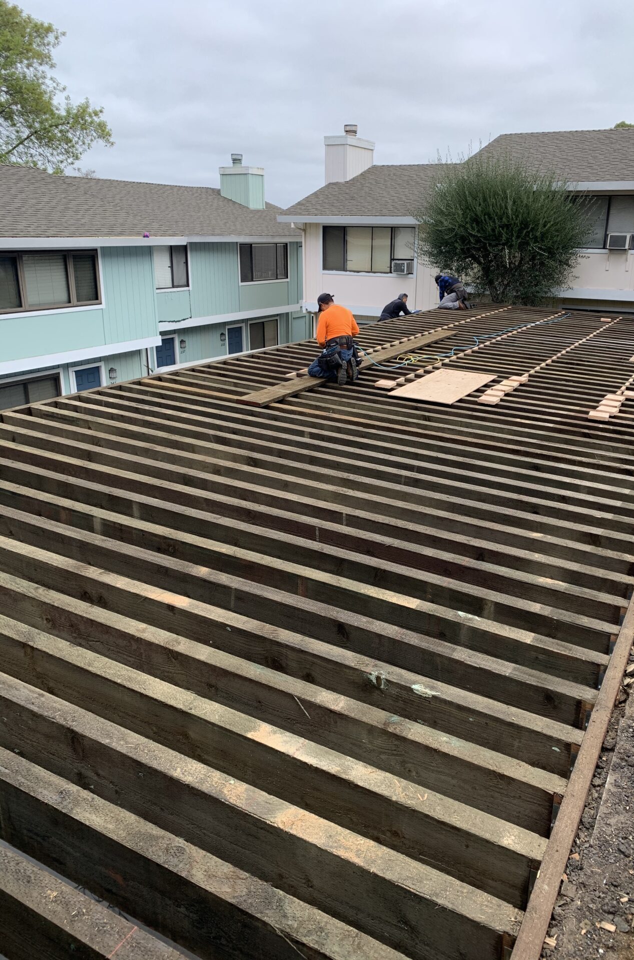 Parking deck framing and joist work before installation of the vehicle-rated surface.